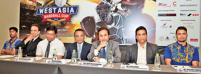From left: Sameera Ratnayake (team captain), Priyantha Ekanayake (CEO Sri Lanka Baseball Association, Chulananda Perera (Secretary to the Ministry of Sports), Fazil Hussain (president SLBA) and Myantha Dissanayake (VP SLAB) Picture by Shan Rambukkwella