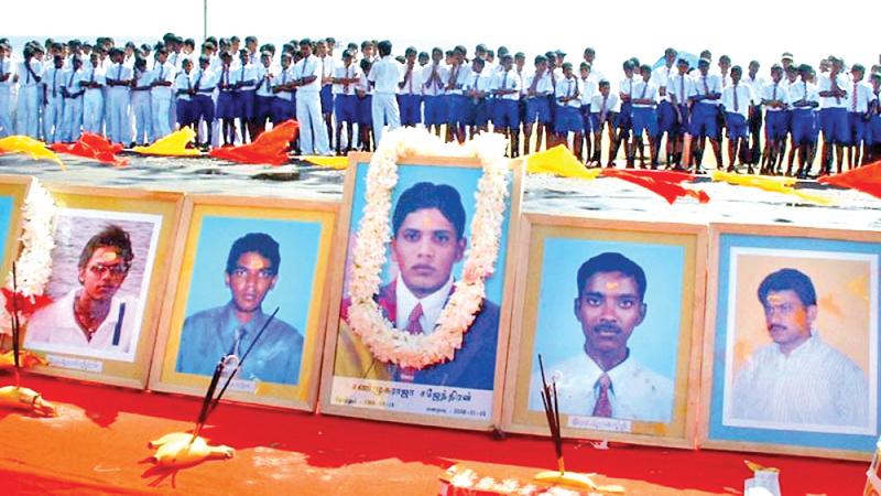 At the annual memorial on the beach, for the Trinco Five