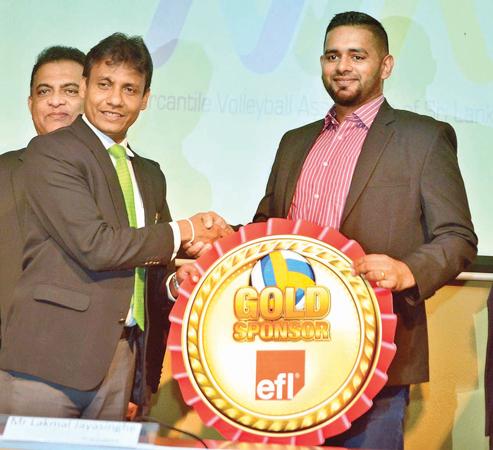 Director Corporate HR MAS Holdings Kolitha Gunetilleke hands over the Platinum sponsorship for the Mercantile Volleyball Championship to the president of the Mercantile Volleyball Association Lakmal Jayasinghe at the press briefing held at the NOC Auditorium on Tuesday. Pic by Vipula Amerasinghe