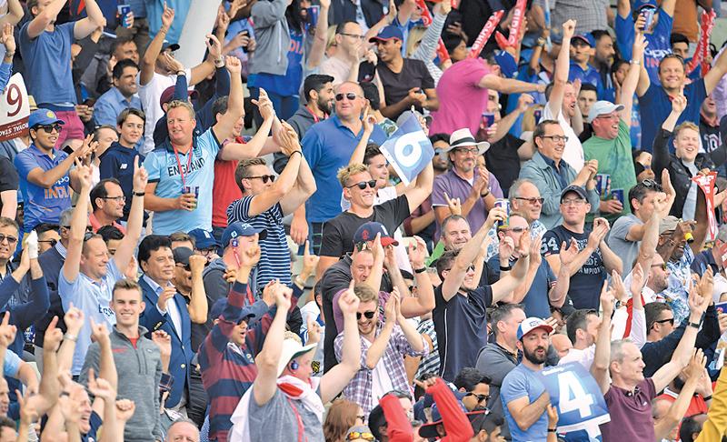 Spectators cheer during the 2019 Cricket World Cup second semi-final between England and Australia at Edgbaston in Birmingham (AFP)