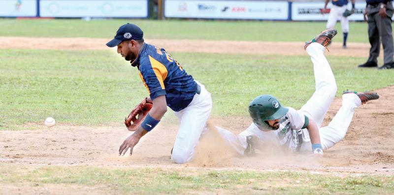 A Pakistan batter makes his ground just in time in the final against Sri Lanka (Pix: Shan Rambukwella)  