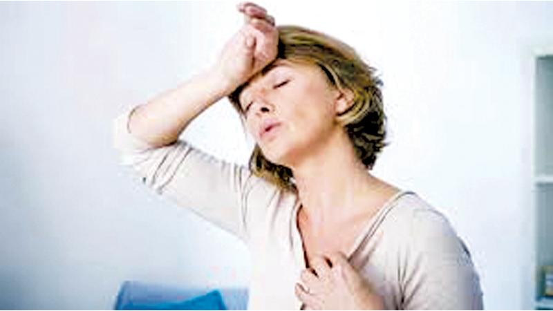 The first sign is hot flushes and excessive sweating with irregular periods
