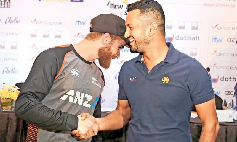 New Zealand cricket captain Kane Williamson (left) and his Sri Lankan counterpart Dimuth Karunaratne greet each other at the launch of their Test and T20 series (Pic by Rukmal Gamage)    