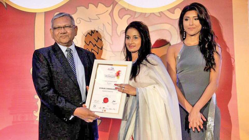 Gitanjali Chakravarthy Haaland receiving the Woman Leadership Award
