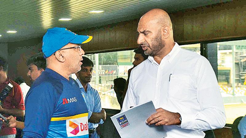 Chandika Hathurusinha (left) with former head Selector Graeme Labrooy when things were not as bad as it is today 