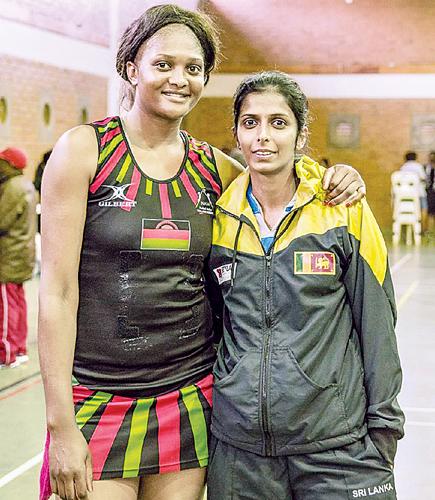 Iresha Harshini(right) with Malawi player Loera Ngwira