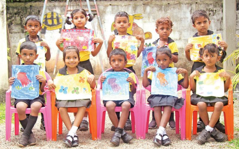 Lamshia Preschool, Yagodamulla, Kotugoda held an Art Exhibition themed ‘Little little Arts’ recently and here are the winners. 1st row from left: Nethran, Dinishi, Udara, Dinali and Jenushi. 2nd row from left: Sahiru, Menara, Vinoth, Sanidu and Thiyum.    Pic: Ravindu Wickramasinghe 