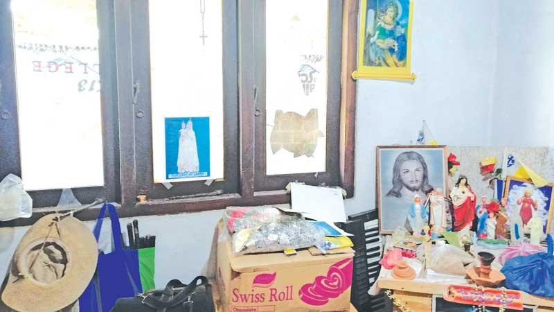 Anne Ranaweera and her trashed home
