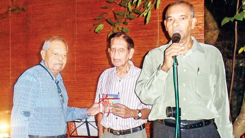 Priya making the CD presentation to Merril Fernando with Laksiri Fernando