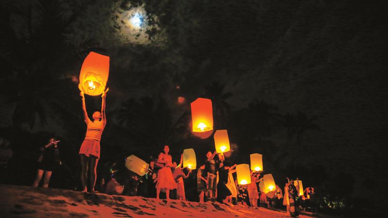 Sending traditional Chinese lanterns 