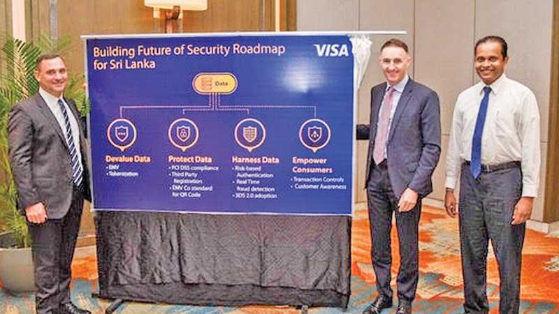 Visa Asia Pacific Head of Risk, Joe Cunningham unveils the Building Future of Security Roadmap for Sri Lanka at the Shangri-La Hotel, Colombo. PCIASL Chairman Thusitha Suraweera and Visa Country Manager Sri Lanka and the Maldives Anthony Watson look on.