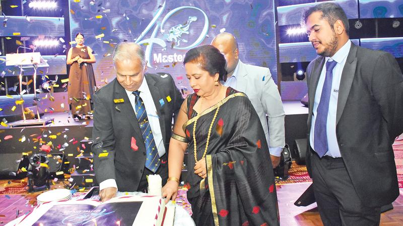 (From left:) Chairman, Master Divers and W. A. Tucker, Ariyaseela Wickramanayake,  his wife, Director Operations Akmal Wickramanayake, Executive Director Toshan Wickramanayake at the  ceremony to celebrate the firm’s 40th anniversary.  