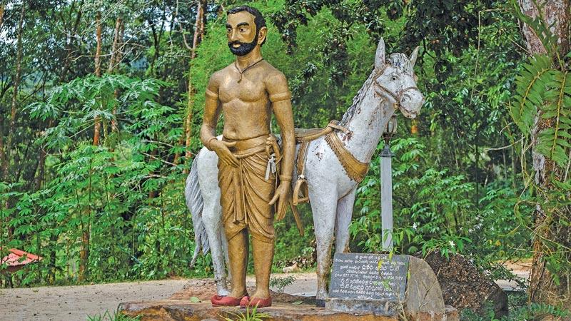HEROIC FIGURE: The view of majestic looking statue of Prince Veediya Bandara and his horse at the temple ground 