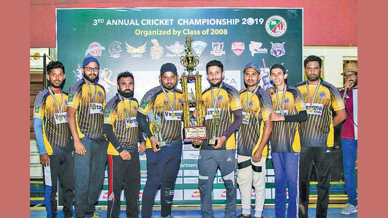 Captain of the champion Strange Giants team SM Usman and members of the side Naleer Lee, M. Nuhaz, Faizan Naseer, M. Muiz, M. Farhan, Sharfan Ameer and M. Mafaza with the champion award