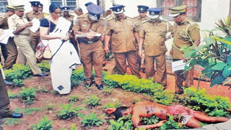 Body of deceased inmate. Magistrate examining the scene of crime around 1:30PM on November 10, 2012