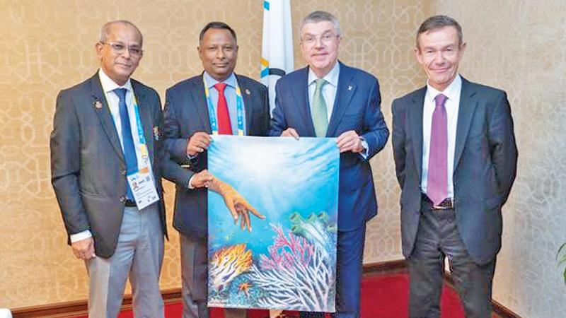 President of the National Olympic Committee of Sri Lanka Suresh Subramaniam and its General Secretary Maxwell de Silva with the International Olympic Committee Chairman Dr. Thomas Bach