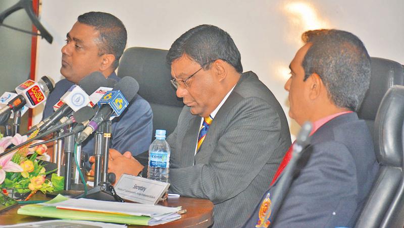 Secretary to the Ministry of Sports Chulananda Perera (centre) addressing the Media on arrangements for the 45th National Sports Festival to be held in Badulla from October 24-27. Also in the picture are Director General Sports Ministry Dhammika Muthugala (left) and Director Sports IP Wijeratne (Picture by Ranjith Asanka)