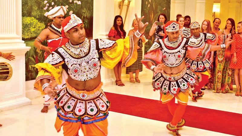    A cultural dance performance to entertain the travel agents.