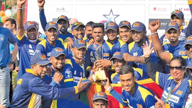 File photo of Sri Lanka’s hearing impaired cricketers celebrating winning the inaugural ICC Deaf T20 World Cup last year     