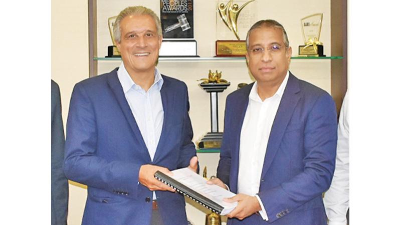 Chief Executive Officer of Barceló Hotel Group, Raúl González exchanges the MoU with Deputy Chairman, LOLC Group and Chairman, Browns Group, Ishara Nanayakkara. 
