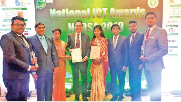 The SriLankan IT team with the two awards