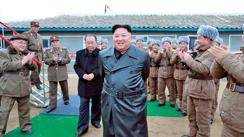 A state media image said to show Kim Jong-un inspecting the testing of a “super-large multiple-rocker launcher”    