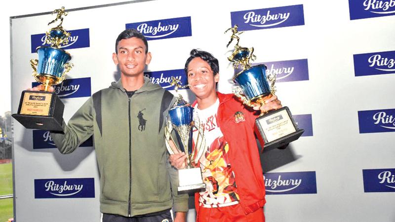 Best athletes M Kaushan (left-De Mazenod College) and Seneka Gunaratne (CIS Kandy) 