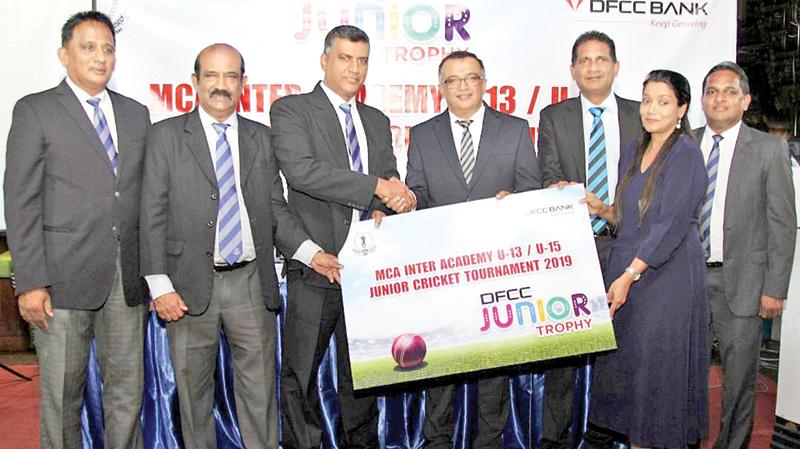 DFCC Bank Chief Operating Officer and Senior Vice President Achintha Hewanayake, Vice President Liabilities and Trade Business Development, Anton Arumugam and Vice President Marketing Nilmini Gunaratne handing over the sponsorship package to the MCA represented by Rohana Dissanayake, President