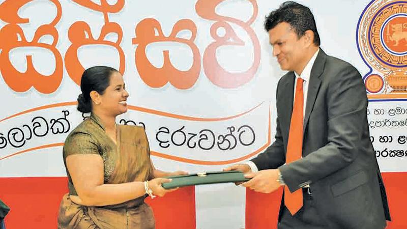 The Commissioner, Department of Probation and Child Care Services, Chandima Sigera and Managing Director, Atlas Axillia, Asitha Samaraweera, exchanging the MoU agreement.   