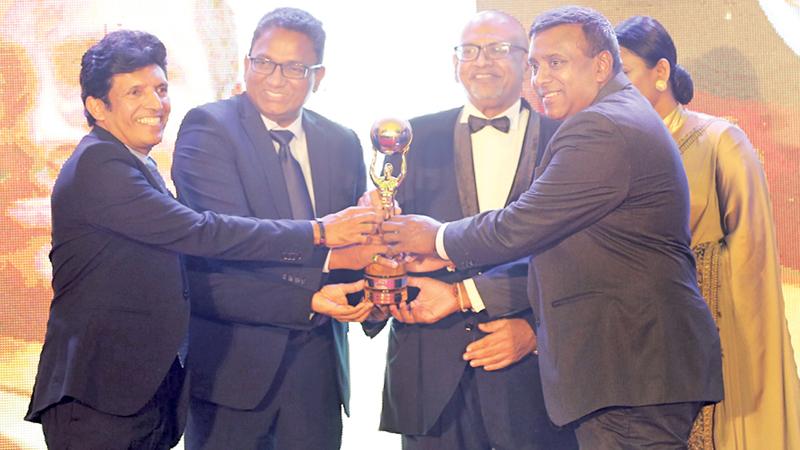 SLT SILK Lifetime Achievement Award for outstanding Contribution to Sports Journalism – Dinesh Weerawansa, presented by ace formula driver Dilantha Malagamuwa