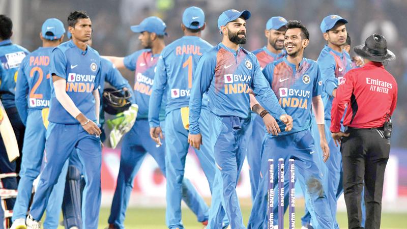 India’s players celebrate after winning the third T20 cricket match against Sri Lanka at the Maharashtra Cricket Association stadium in Pune on January 10 AFP