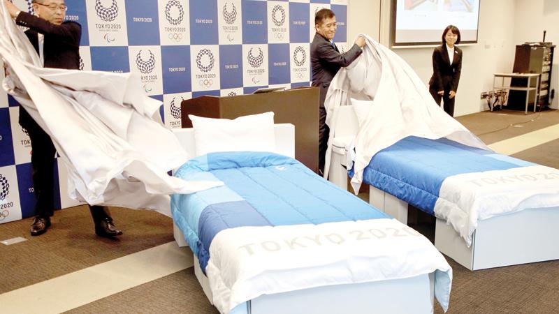 In this picture taken on September 24, 2019  beds made of cardboards for the Tokyo 2020 Olympic and Paralympic Village are displayed in Tokyo. - Randy athletes worried that eco-friendly cardboard beds could curtail their sex life at this summer’s Tokyo Olympics can breathe easy -- they’re sturdy enough, say manufacturers. (AFP) 