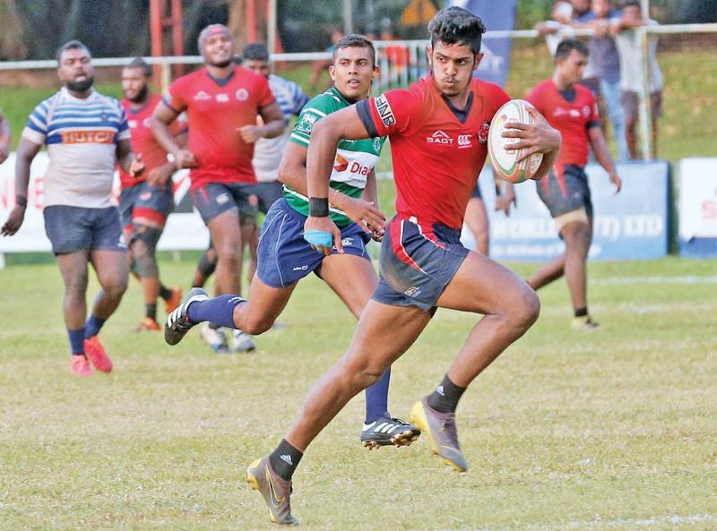 Janidu Dilshan of CR makes a break against Navy (Pic by Shan Rambukwella)