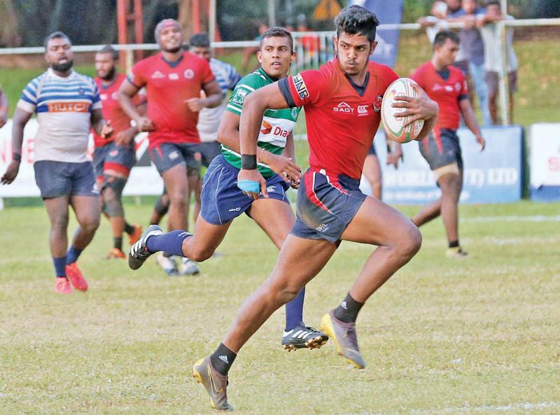 Janidu Dilshan of CR makes a break against Navy  (Pic by Shan Rambukwella)    