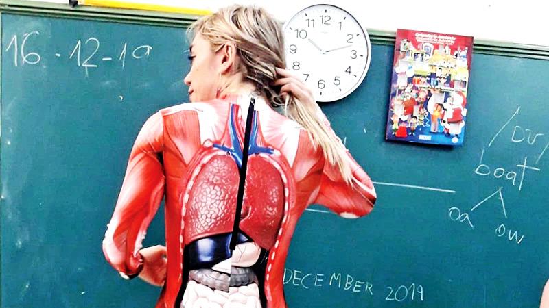 Teacher goes viral for wearing skin-tight anatomy bodysuit to