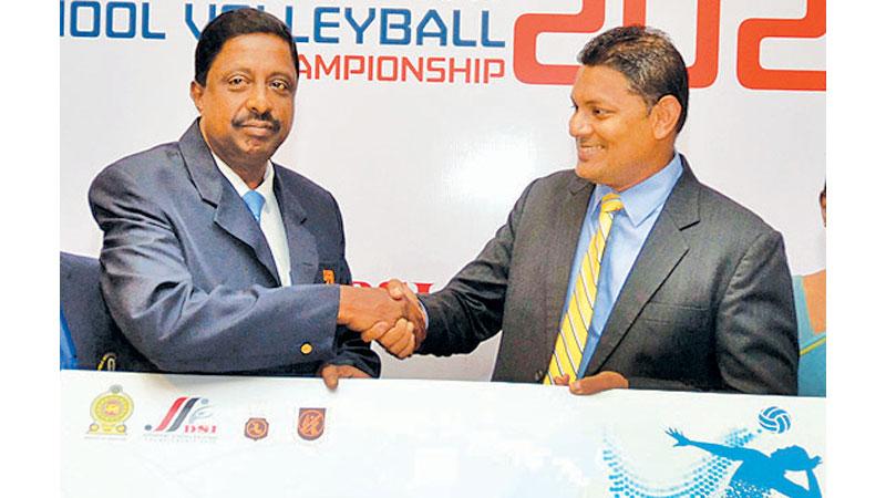 Managing Director of D. Samson Sons Thusitha Rajapakse (left) presents the sponsorship for the 20th DSI Schools Super Sport VB Championship to Secreatary General SLVBF AS Nalaka. (Picture by Vipula Amarasinghe)    