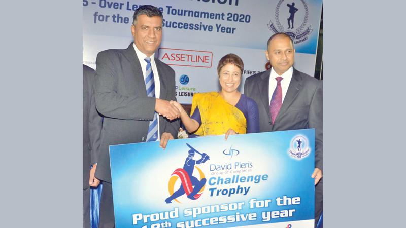 Executive Director, DPMC, Romani Parakrama (center),  CEO Naresh Tillekaratne and Chief Operations Officer presenting the sponsorship to MCA President, Rohana Dissanayake (Picture by Vipula Amerasinghe)