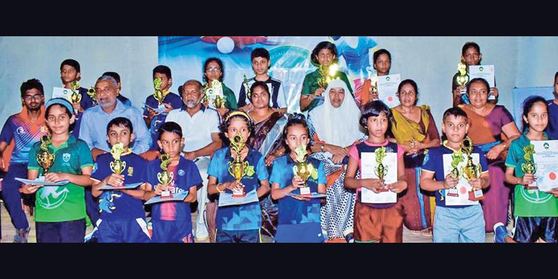 The winners: Thashini Rehansa, Thanuja Dewnitha, Senuki Nithaya, Dewsara Dihen, Senuki Thasanga, Vikum Kesara, Maleesha Sandali, Rithik Chamika, Ruhini Rovinya, Chamod Kulasekera, Kavindu Chiran, Chameesha Thushadi, Chanuka Sri Bandara and JA Cader with their trophies  