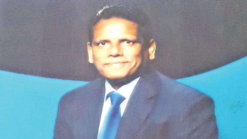 Dr. Tiran Peiris   