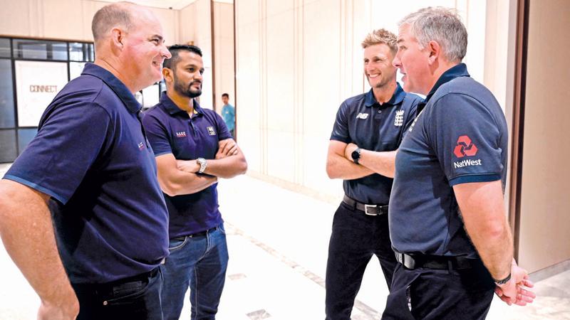 Sri Lanka cricket coach Mickey Arthur and team captain Dimuth Karunaratne (left) talk to England captain Joe Root and coach Chris Silverwood before aborting the tour     