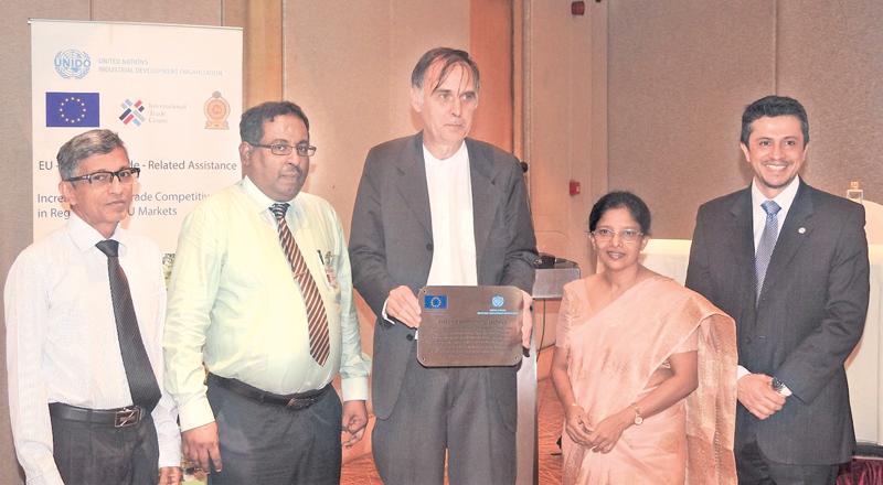 From left: Deputy Director General, Environmental Health, Occupational Health and Food Safety, Ministry of Health,Dr. Lakshman Gamlath, Deputy Director General, Planning, Dr. S. Sridharan, Head of Cooperation, Delegation of the European Union to Sri Lanka and the Maldives, Frank Hess, Consultant Microbiologist and Head of the Food and Water Laboratory of MRI, Dr. Sujatha Pathirage, and International Technical Specialist, UNIDO, Dr. Jairo Andres Villamil Diaz at the presentation of the certificate.  