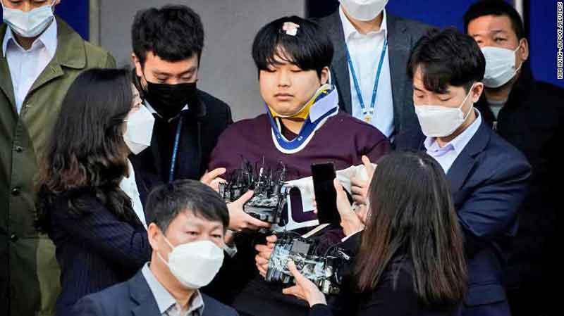 Cho Joo-bin, who allegedly ran an online sexual blackmail ring, walks out of a police station as he is transferred to a prosecutor’s office in Seoul, South Korea