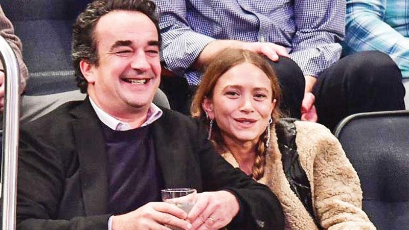 Olivier Sarkozy and Mary-Kate Olsen attend New York Knicks vs Brooklyn Nets game at Madison Square Garden on November 9, 2016 in New York City