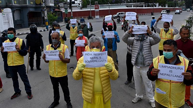 Activists protest against India's newly inaugurated link road to the Chinese border, near the Indian embassy in Kathmandu 