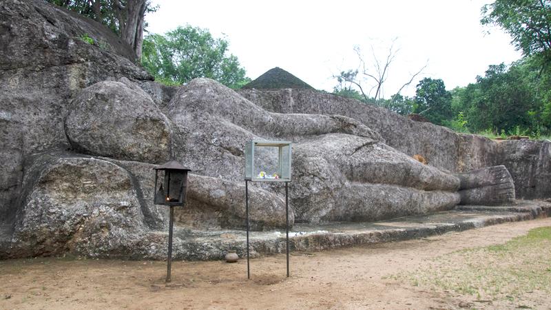 The rock-hewn recumbent Buddha statue of Ataragalleva in Elahera