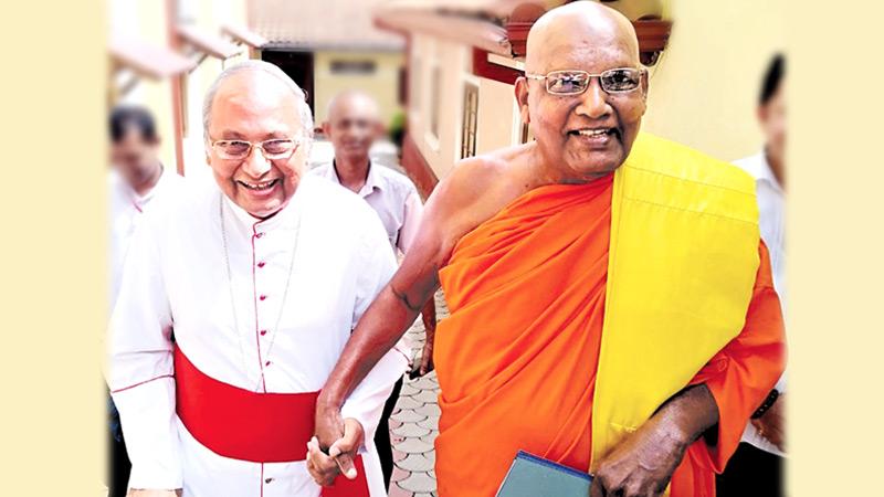 His Eminence Malcolm Cardinal Ranjith given a hand by Ven. Dr. Ittapana Dharmalankara Thera, the Mahanayake of Kotte Sri Kalyani Samagri Dharma Maha Sanga Sabha of Siyam Maha Nikaya