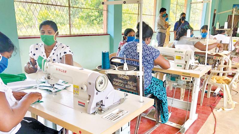 Women sewing face masks