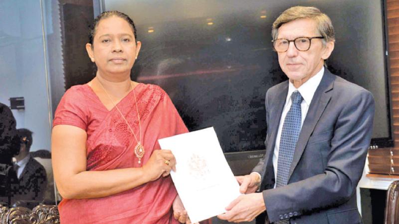 Health Minister Pavithra Wanniarachchi with the Russian Ambassador Yury B. Materiy.