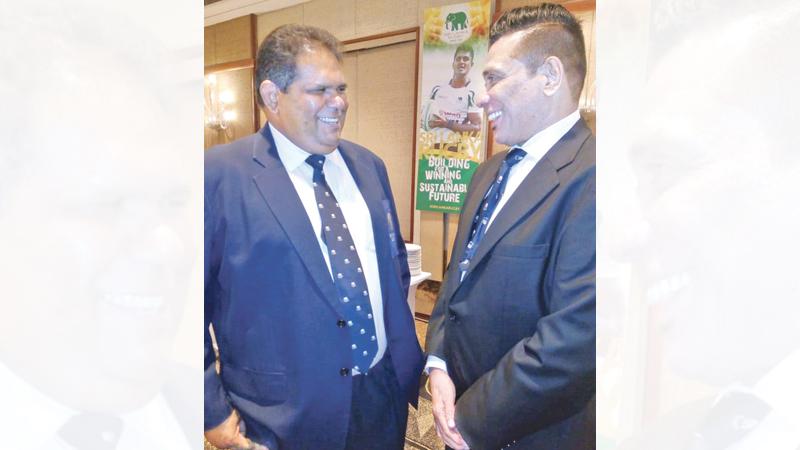 Outgoing rugby chief Lasitha Gunaratne (left) and Rizly Illyas share a moment    