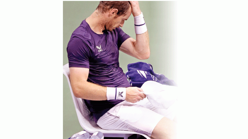 Andy Murray of Great Britain  reacts at a changeover during his  Singles second round match against Felix  Auger-Aliassime of Canada AFP